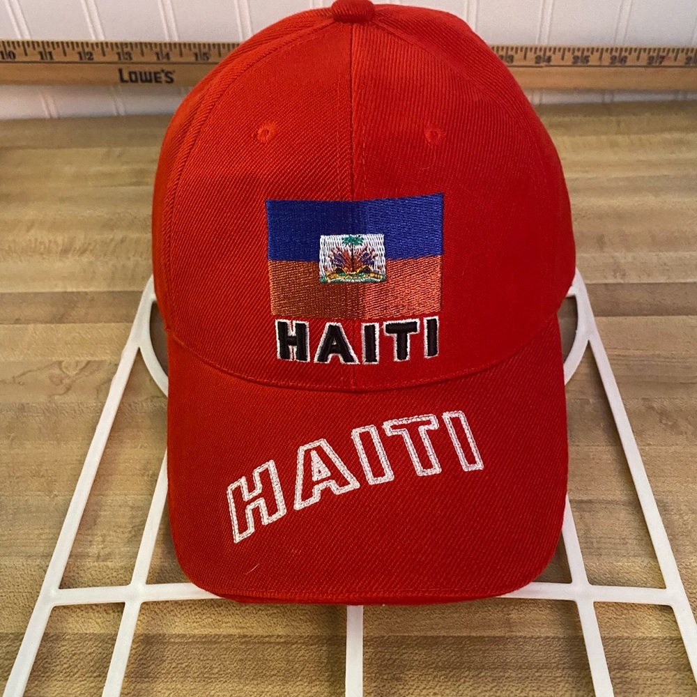 Preowned Men’s “ Haiti” Hat/Cap. Adjustable, Red/ Logo.